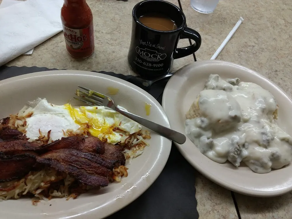 The 'Works' Eggs Hash Browns Bacon Biscuits and Gravy